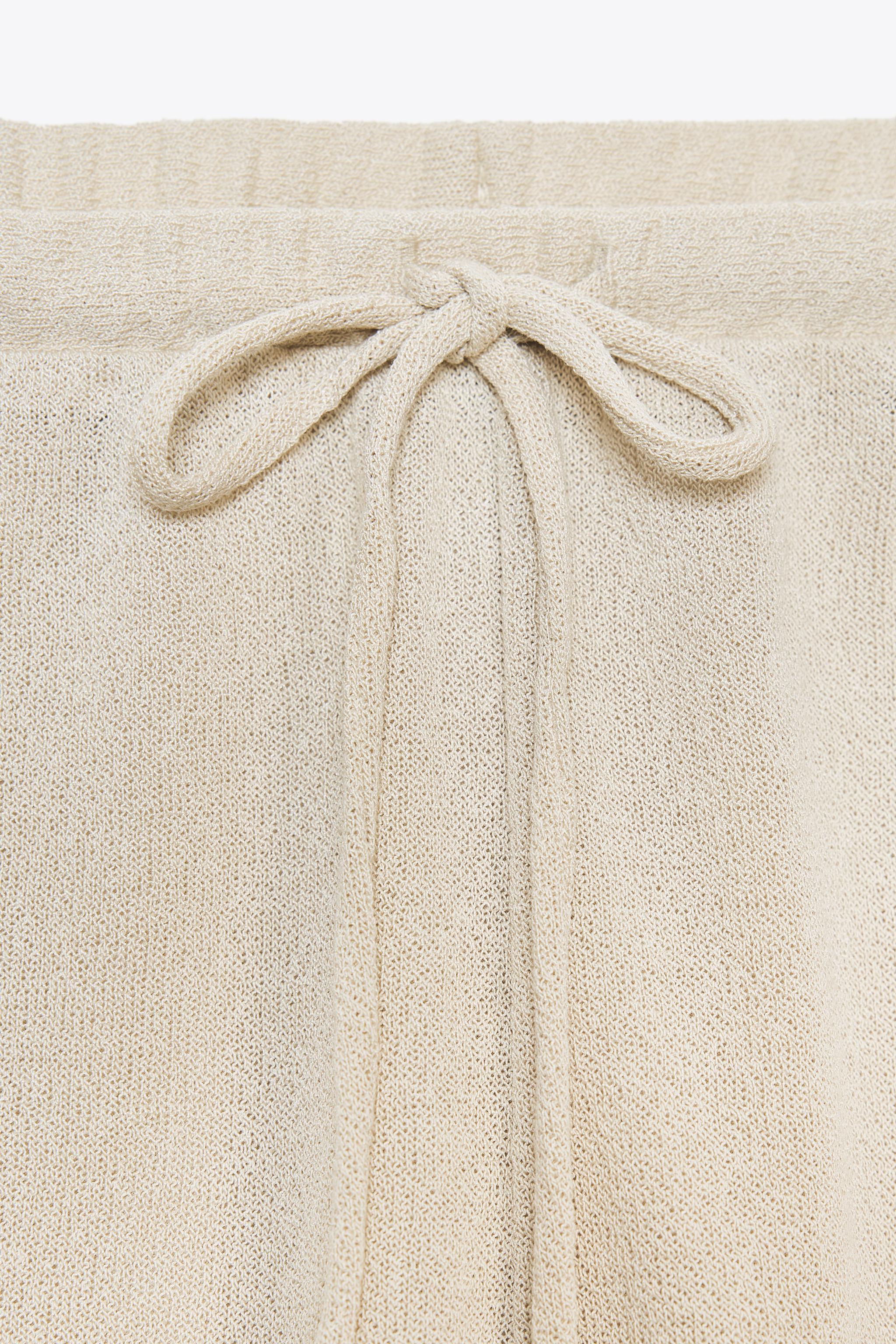 PANTALON EN MAILLE AJOURÉE